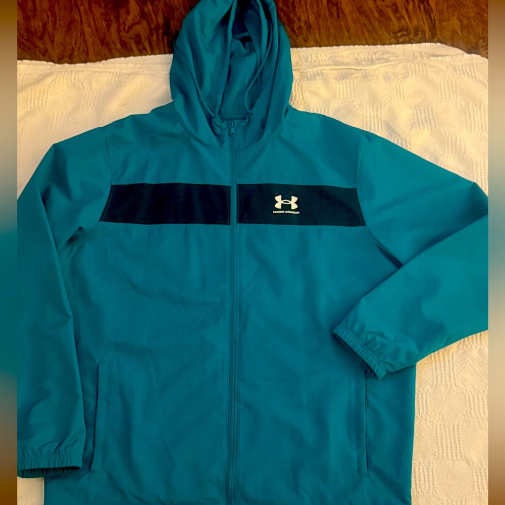 Under Armour Performance Jacket, designed in striking teal/black..